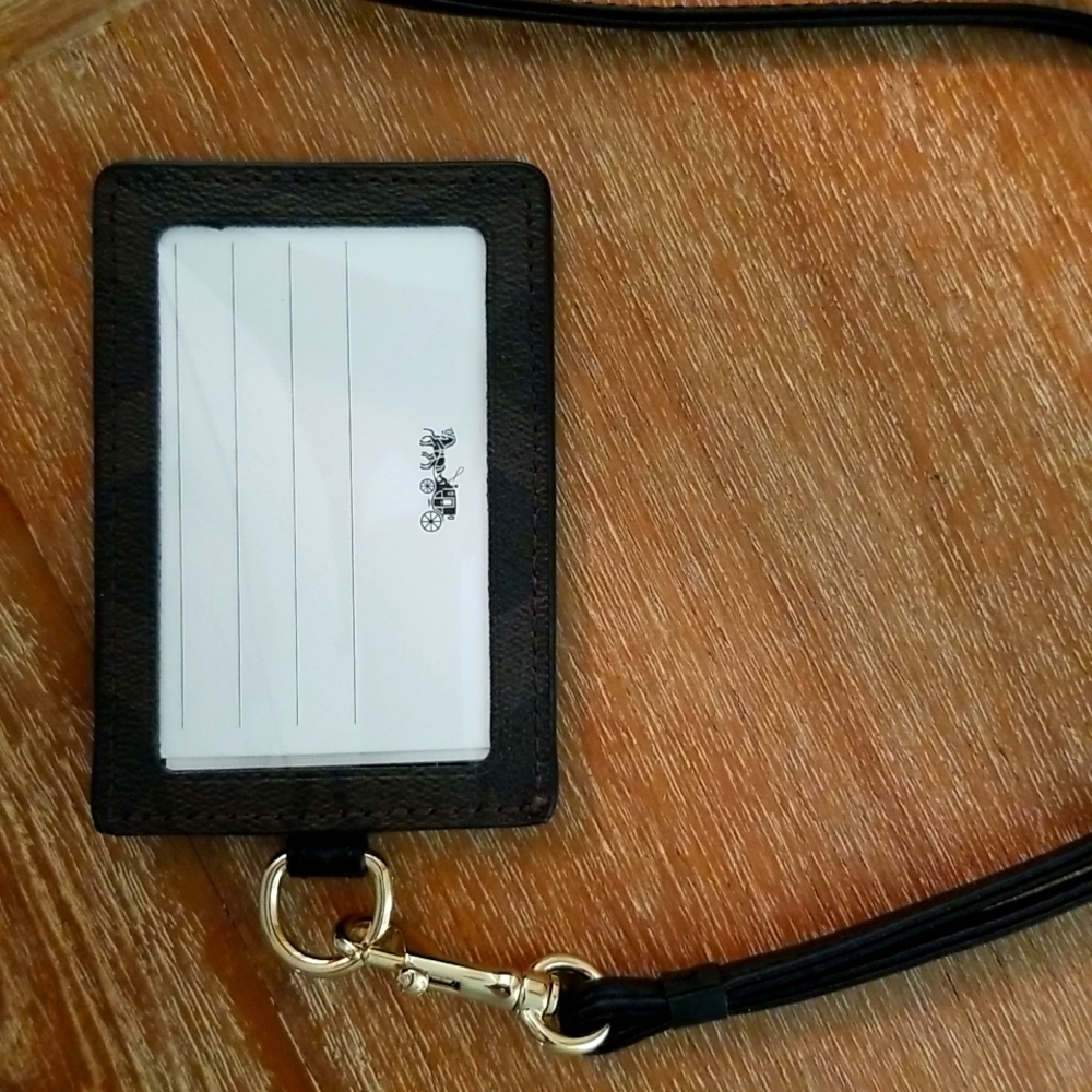 Coach leather Pull with ID tag